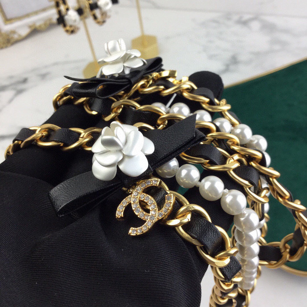 CHANEL 25S CHAIN BELT IN WHITE PEARL AND BLACK CALFSKIN 614403